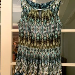 Cute scuba fit and flare sleeveless dress.